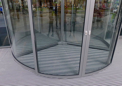 ALU mats in revolving doors