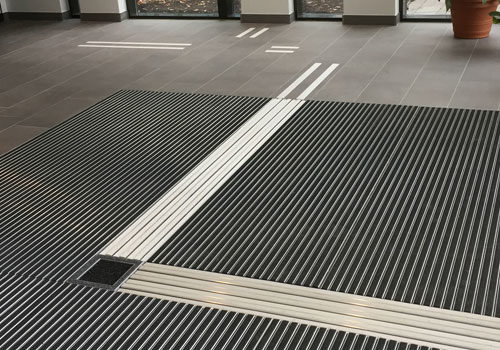 ALU mat with ATF tactile guide strip